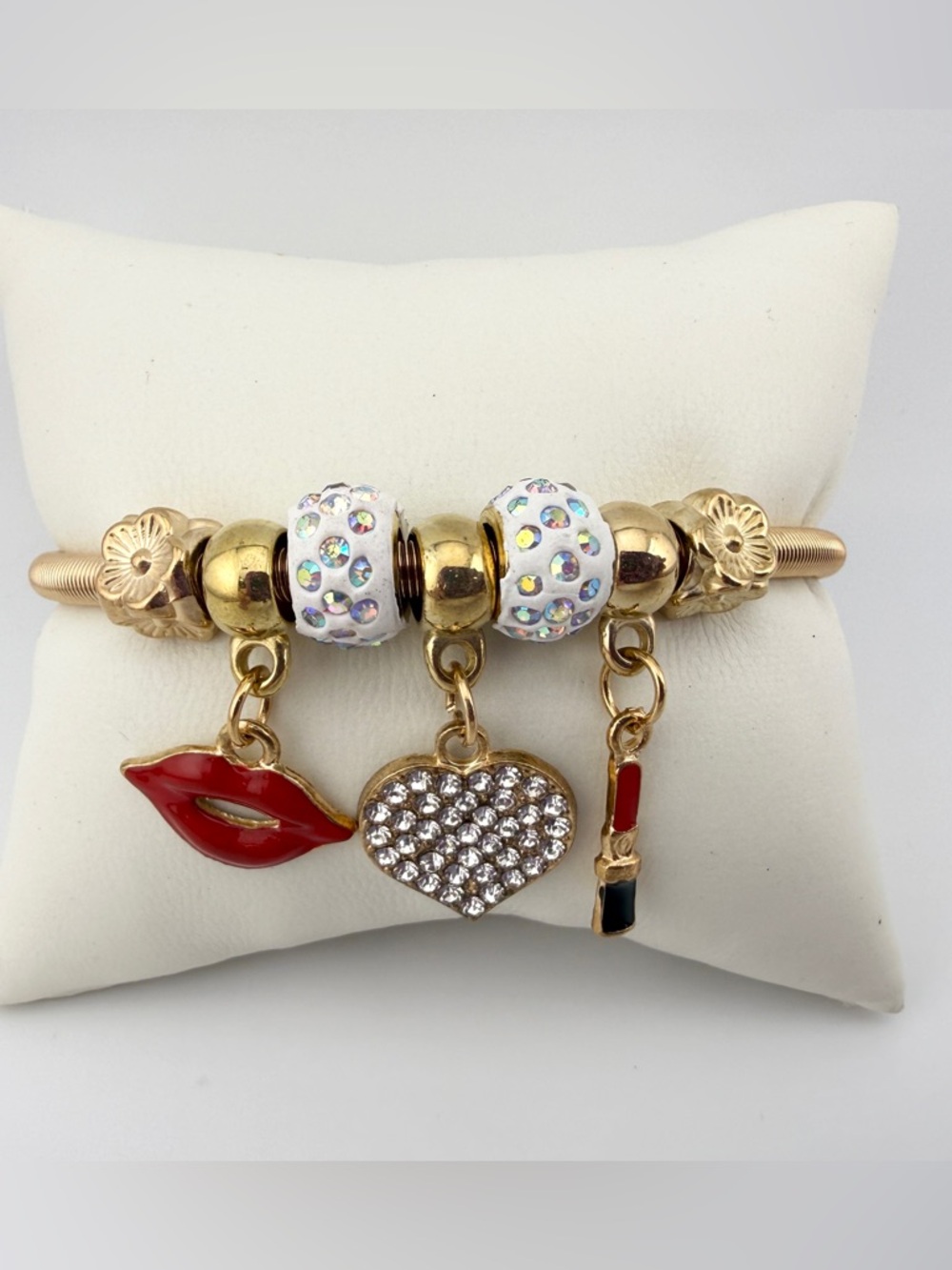Gold-Tone Charm Stretch Bracelet with White Crystal Beads and Red Accents